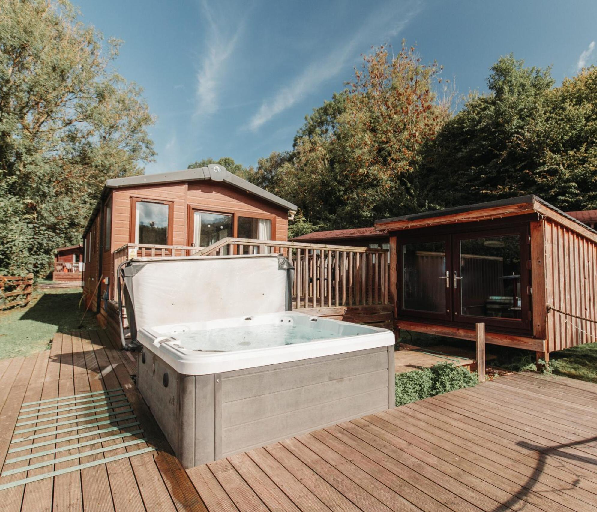 Herons Lake Retreat Hot Tub Lodges Caerwys Exterior photo